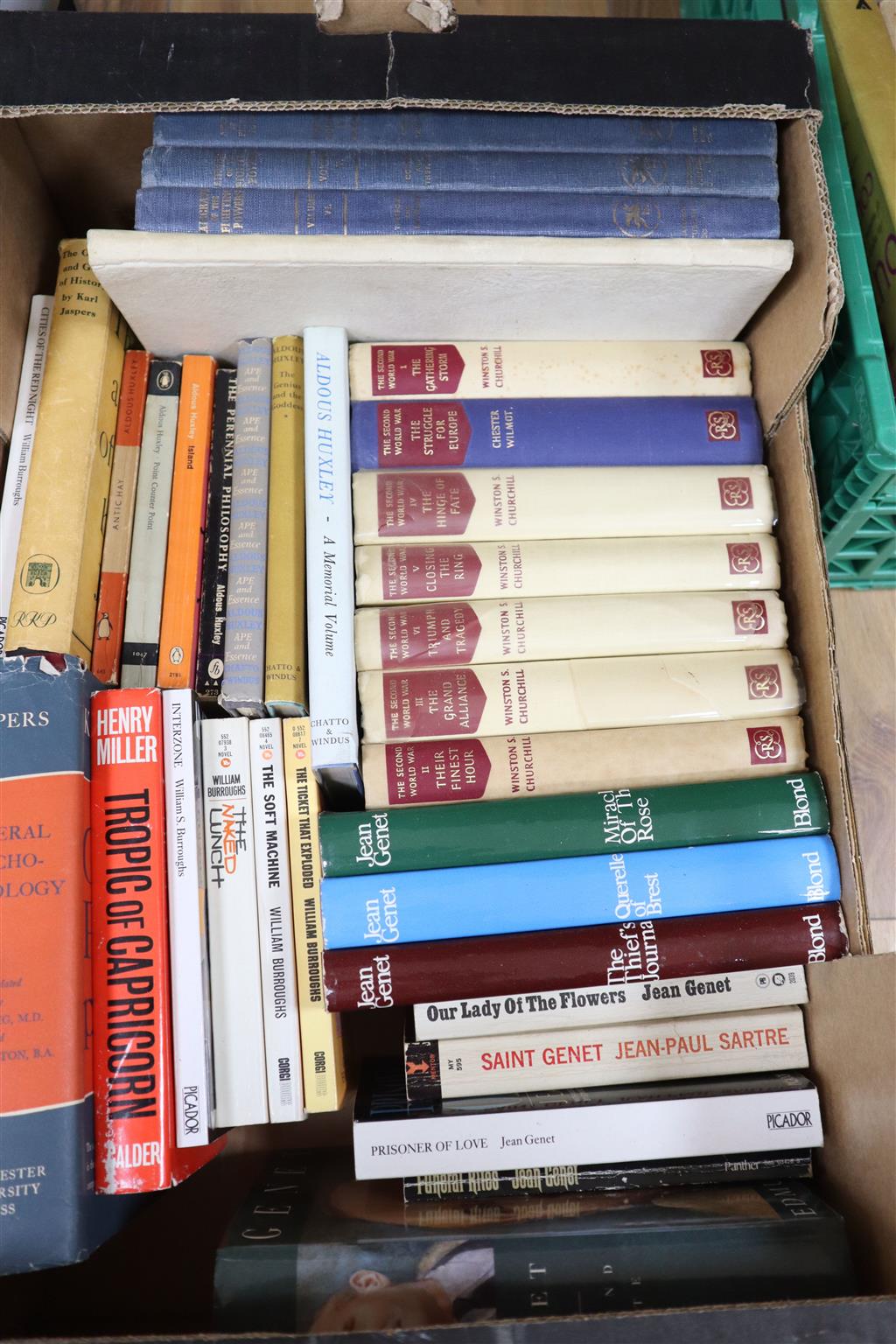 Three boxes of books, including Essays In Musical Analysis, Human Sexual Response, Tropic of Capricorn, The Divine Banquet of The Brain